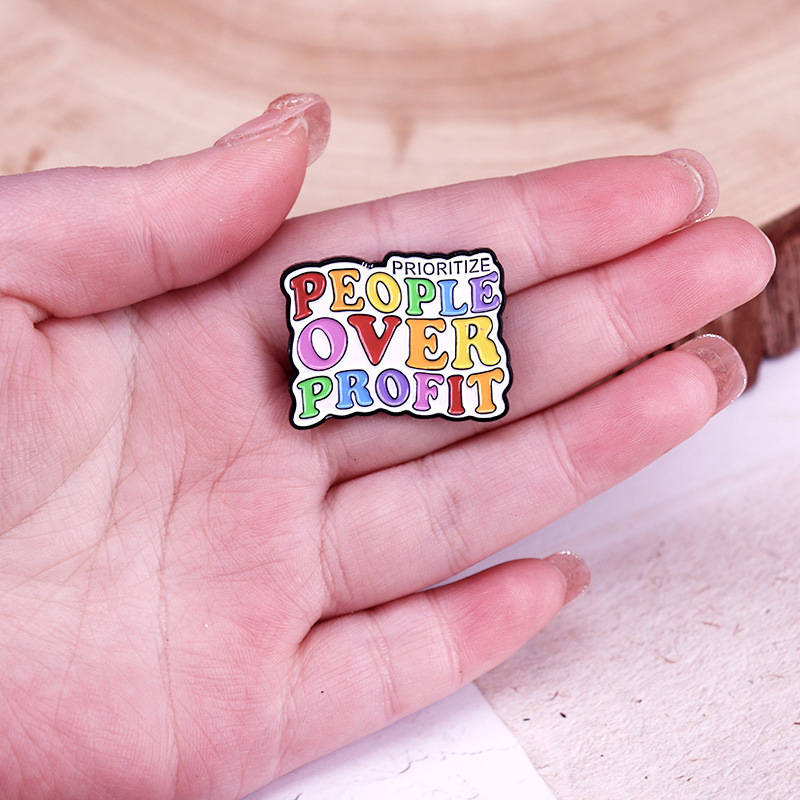 Give Priority To People Rather Than Profit Enamel Pin Rainbow Badge - Image 3