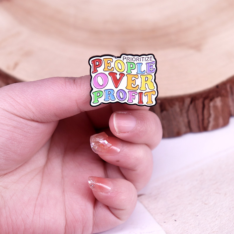 Give Priority To People Rather Than Profit Enamel Pin Rainbow Badge - Image 4