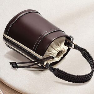 Brown Cylindrical Tote Bag With Dual Handles, Designed For Handheld Or Crossbody Wear