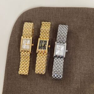 Golden Quartz Rectangular Watch With A Steel Band For Women